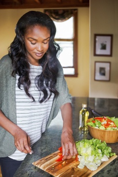 Woman prepping food through YMCA Diabetes Prevention Program